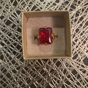 Elegant Gold Ring with Red Gemstone